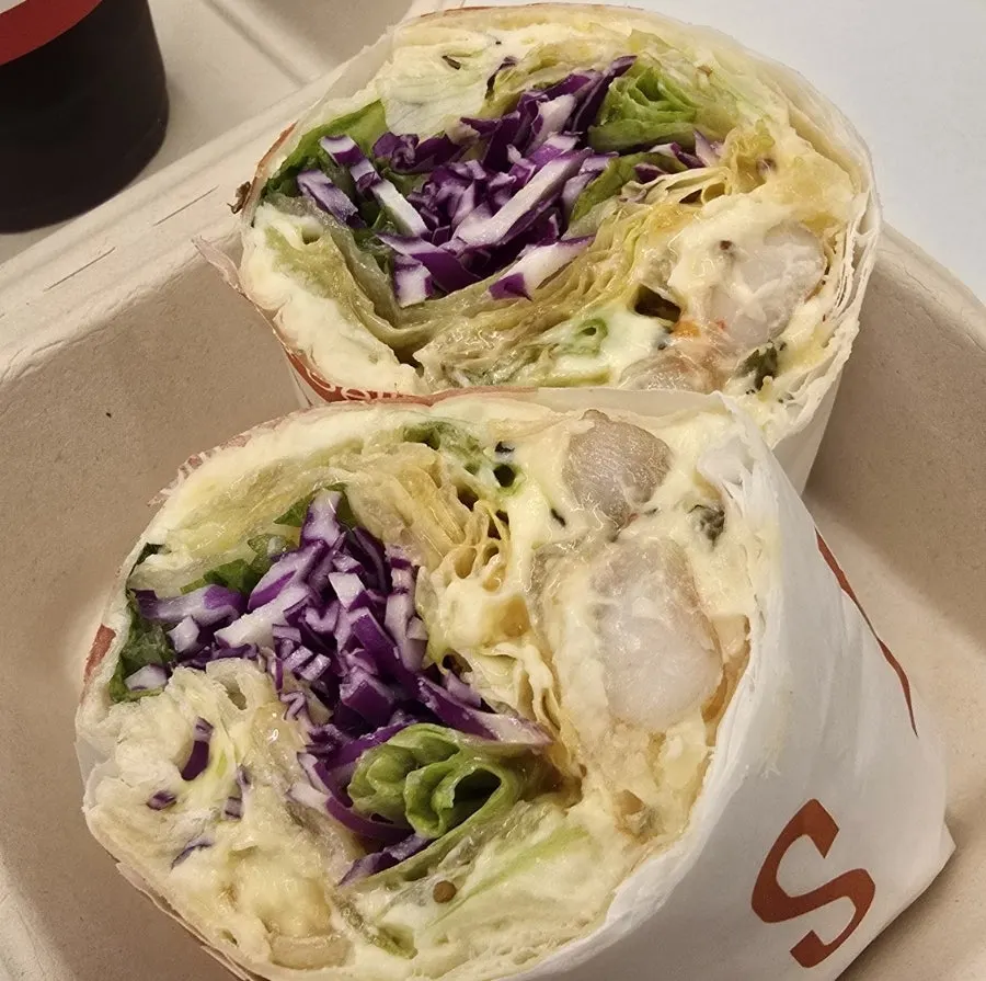 Whole shrimp wrap, crispy chicken wrap, and poke salad