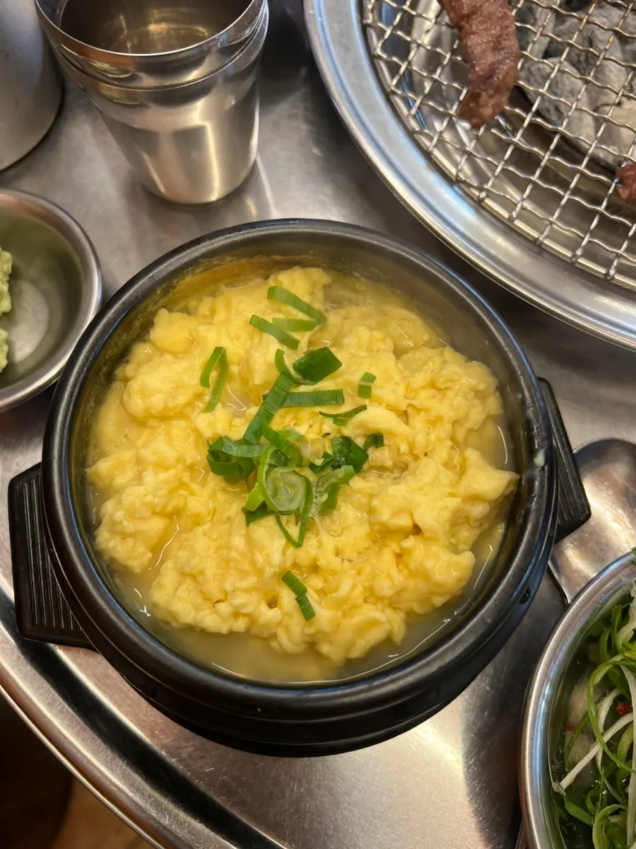 Bubbling steamed egg dish served as a basic side