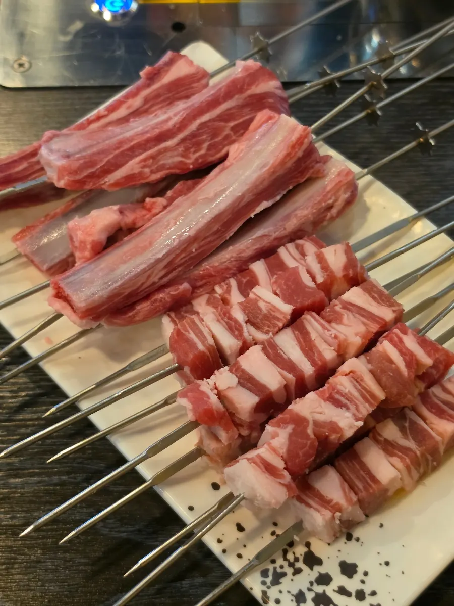 Spices served with lamb skewers