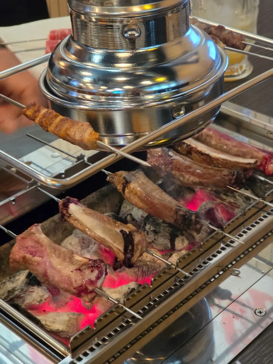 Lamb skewers served with onion