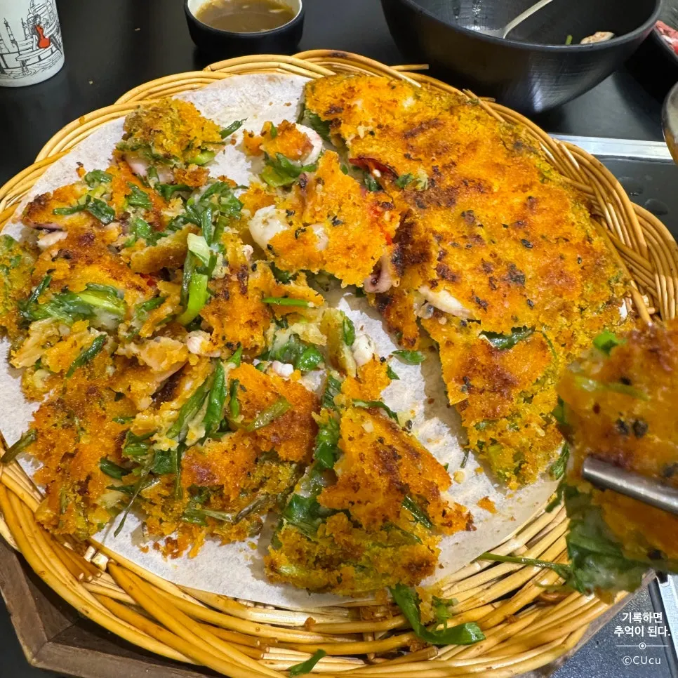 Thick scallion pancake with seafood and chili peppers