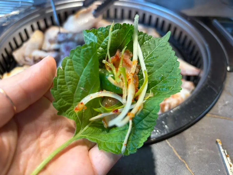 A generous Korean barbecue meal spread