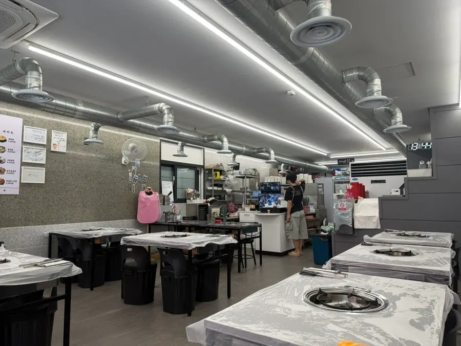 Spacious, clean interior seating at Bupyeong Yang Gopchang