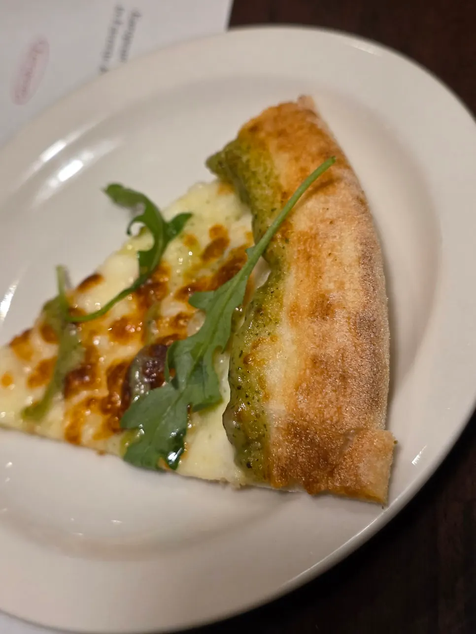 Margherita pizza with cheese and basil sauce