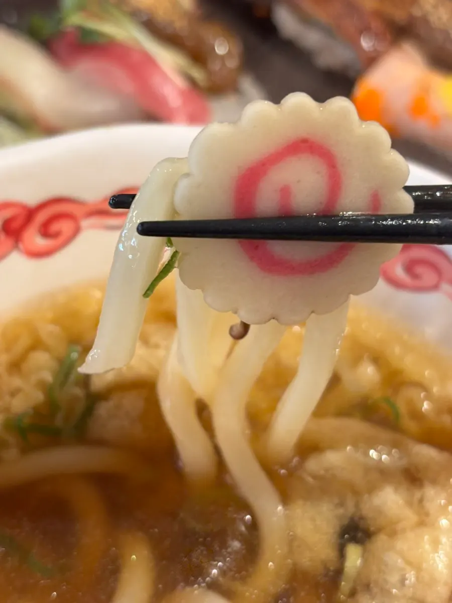 Steaming udon broth and noodles