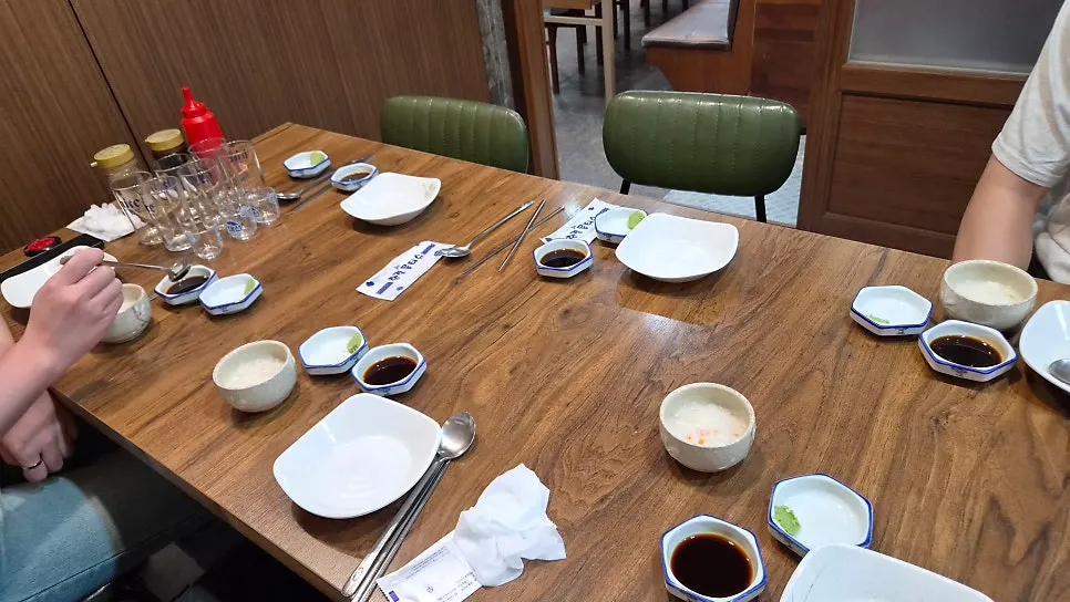 Second-floor space and seating at Busan Bokjip