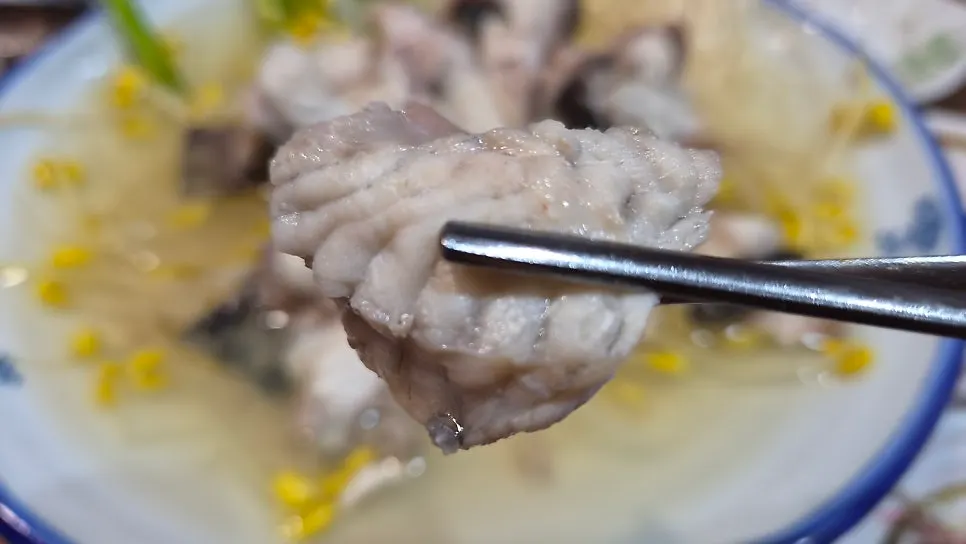 Tender steamed pufferfish with side vegetables