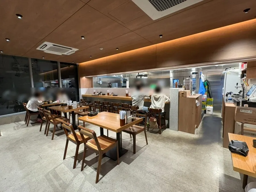 Wood-toned interior of Katsu Gimseondo