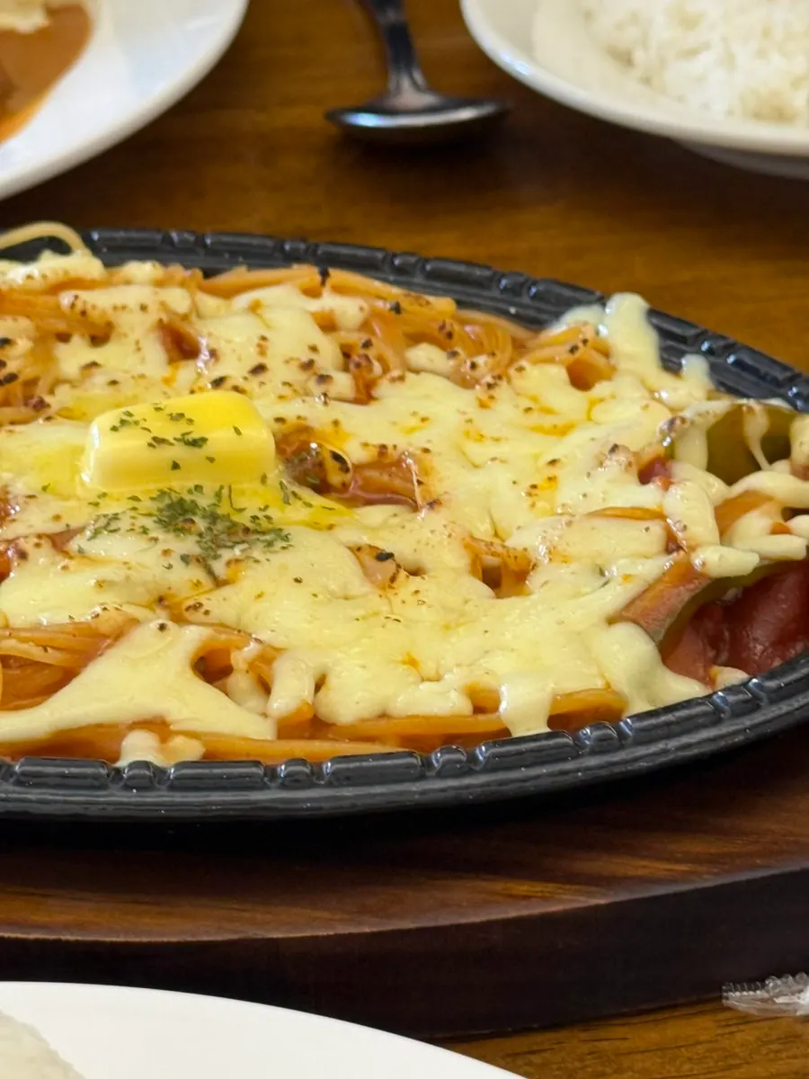 Cheese Napolitan spaghetti on an iron plate