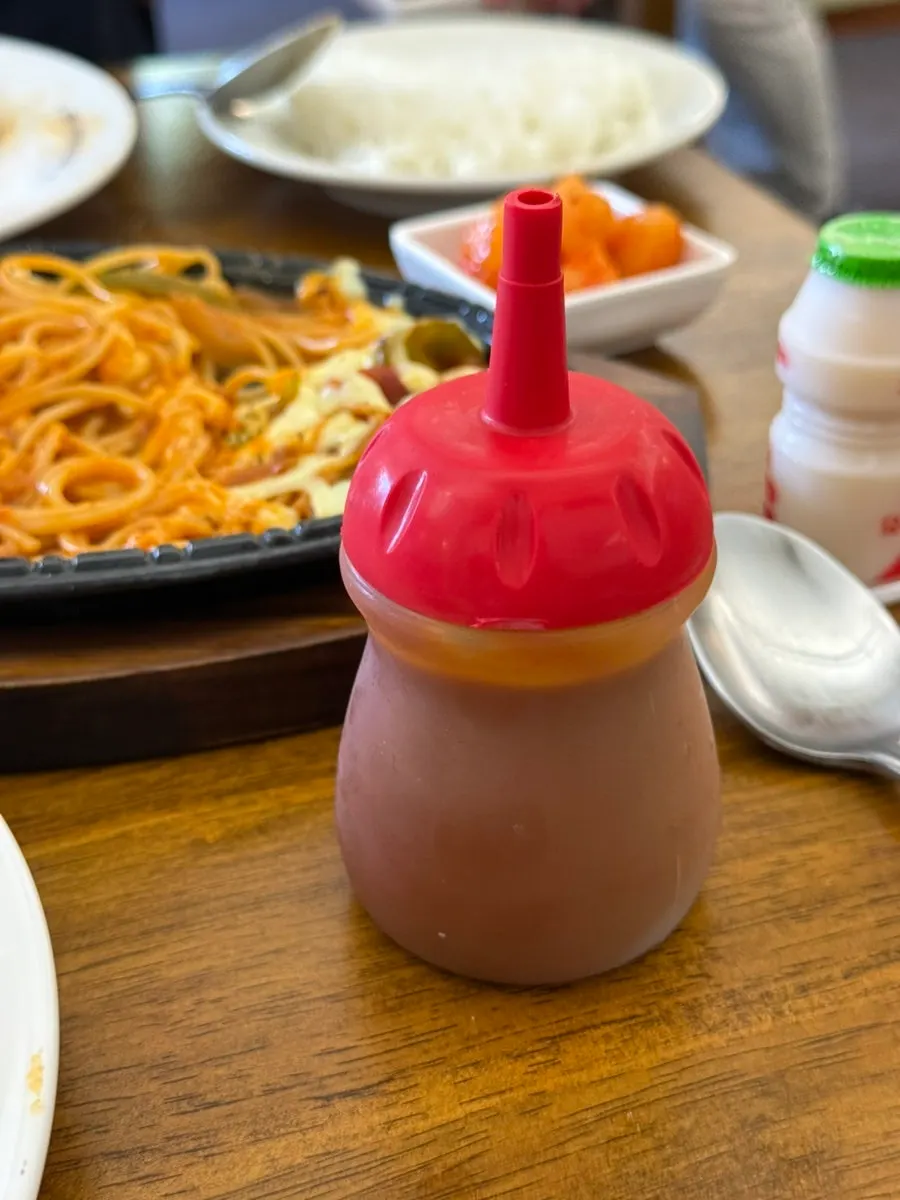 Spicy sauce served with pork cutlet