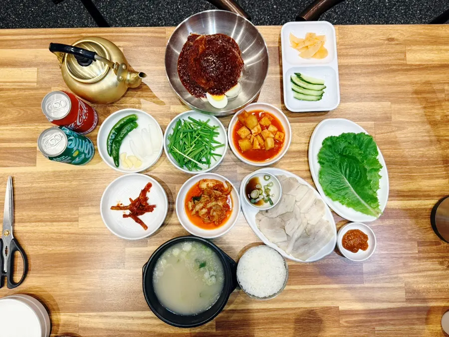 Table set with bibim milmyeon and suyuk baekban