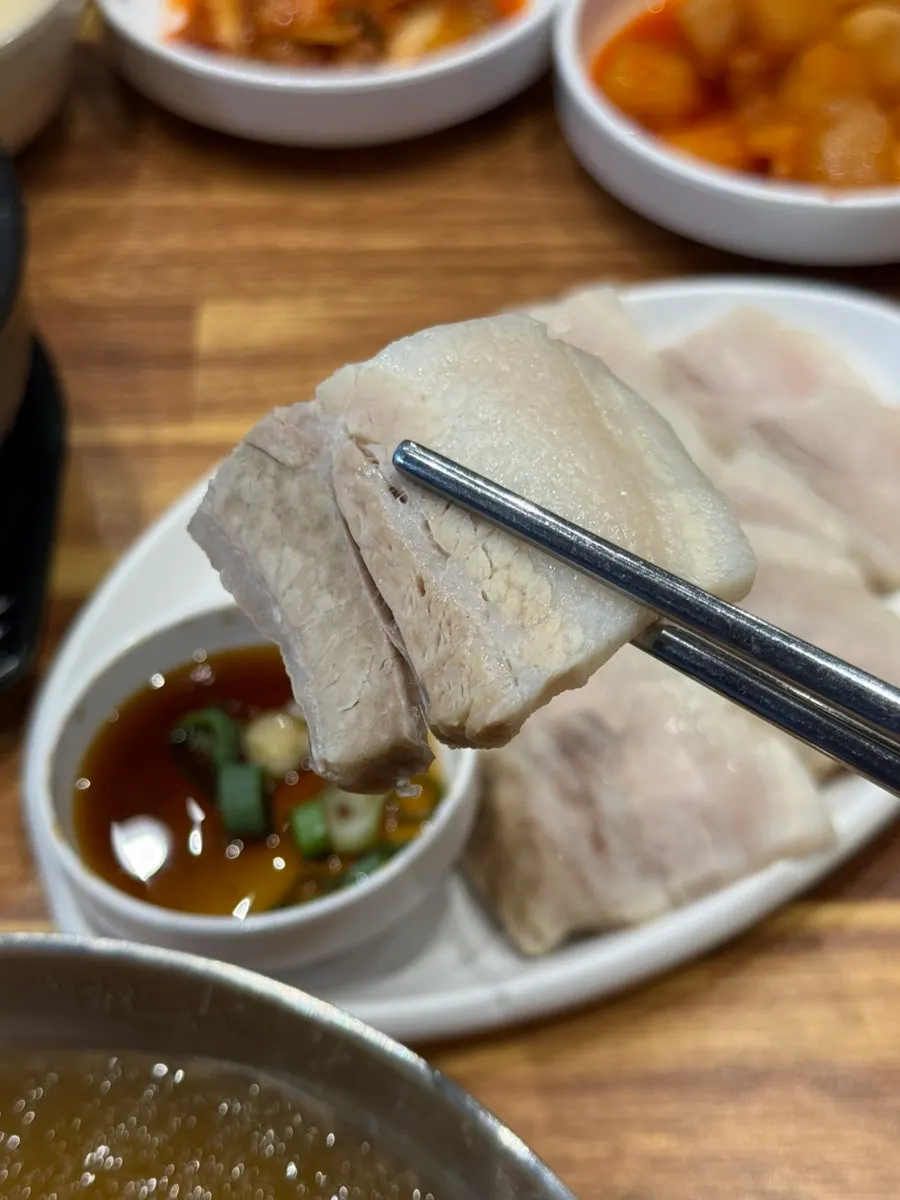 Suyuk baekban with a bowl of rice