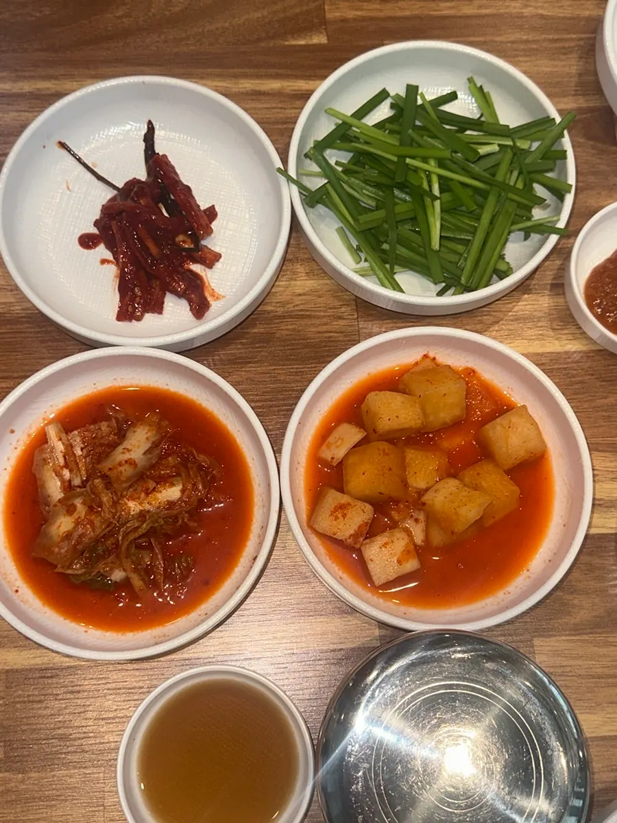 View of the meal from a window seat at Yeongdong Milmyeon & Dwaeji Gukbap Busan Station Branch