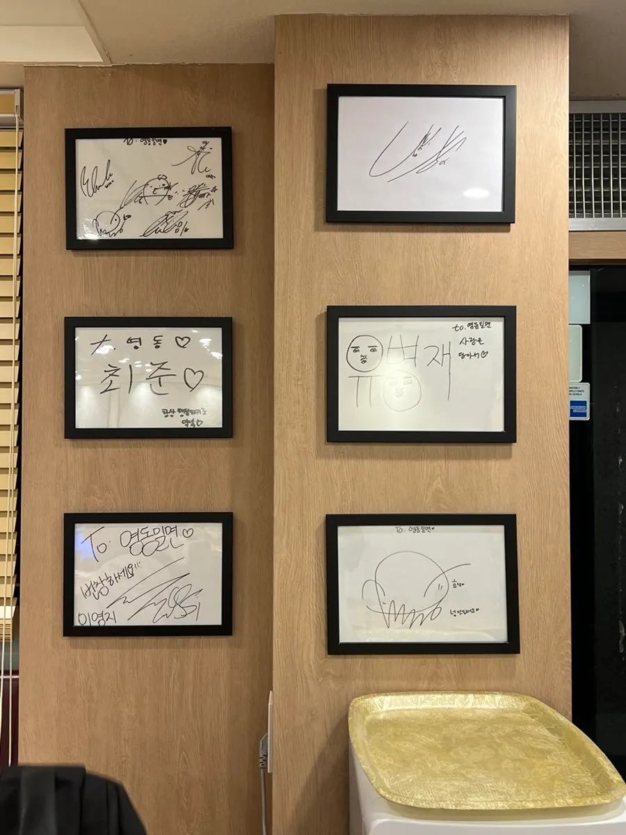 Sign for Yeongdong Milmyeon & Dwaeji Gukbap in the Chinatown alley