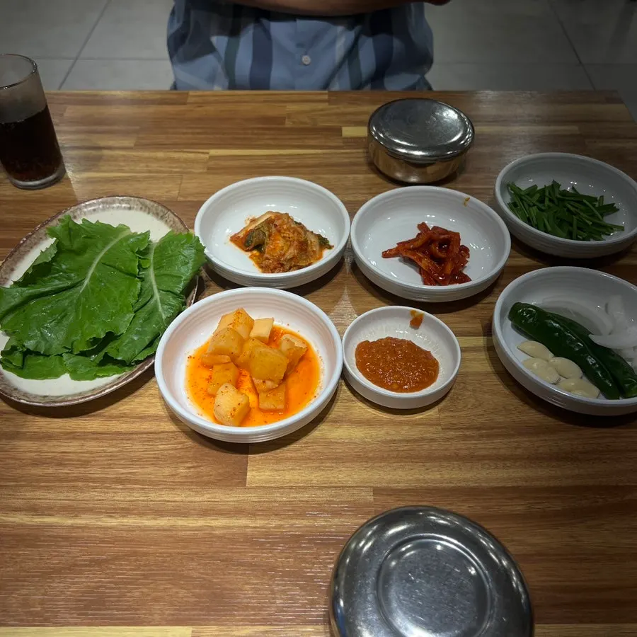 Chili paste, salted shrimp, pepper, vinegar and mustard on the table
