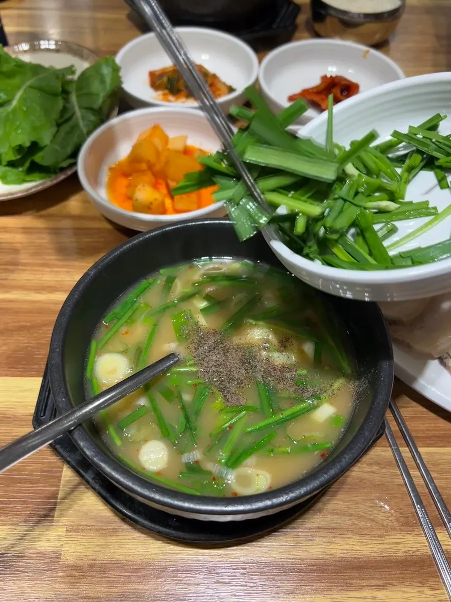 Leftover suyuk and rice mixed into the broth
