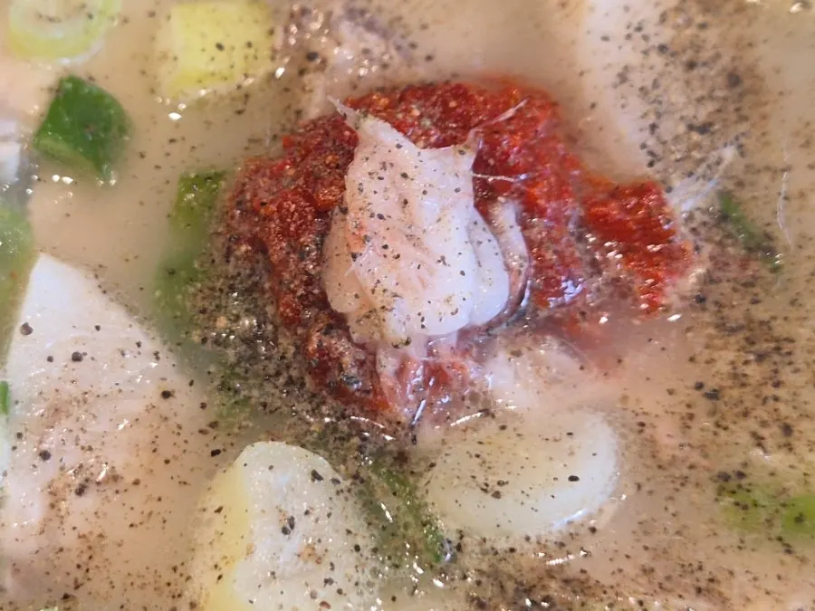 A spoonful of rice and meat from the dwaeji gukbap
