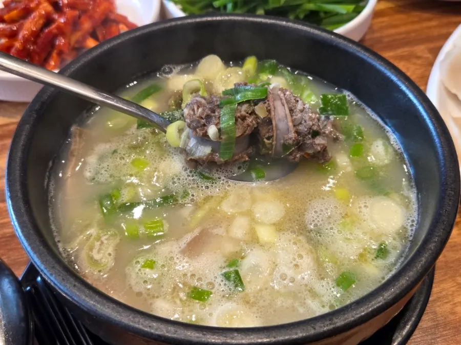 Dwaeji gukbap with rice mixed in