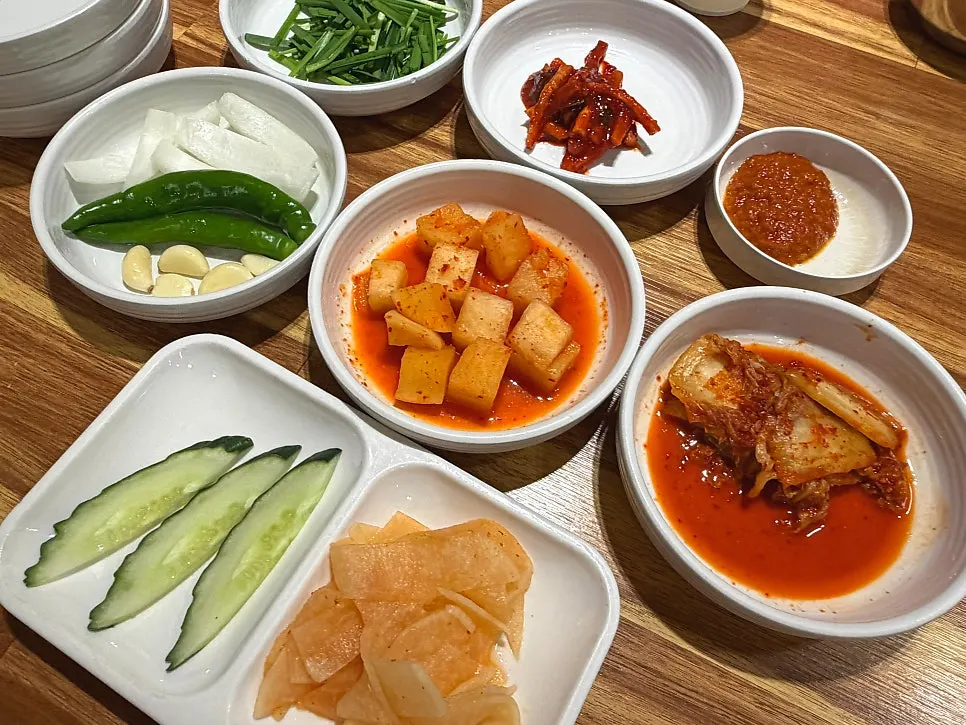 Plate of diced radish kimchi and cabbage kimchi side dishes