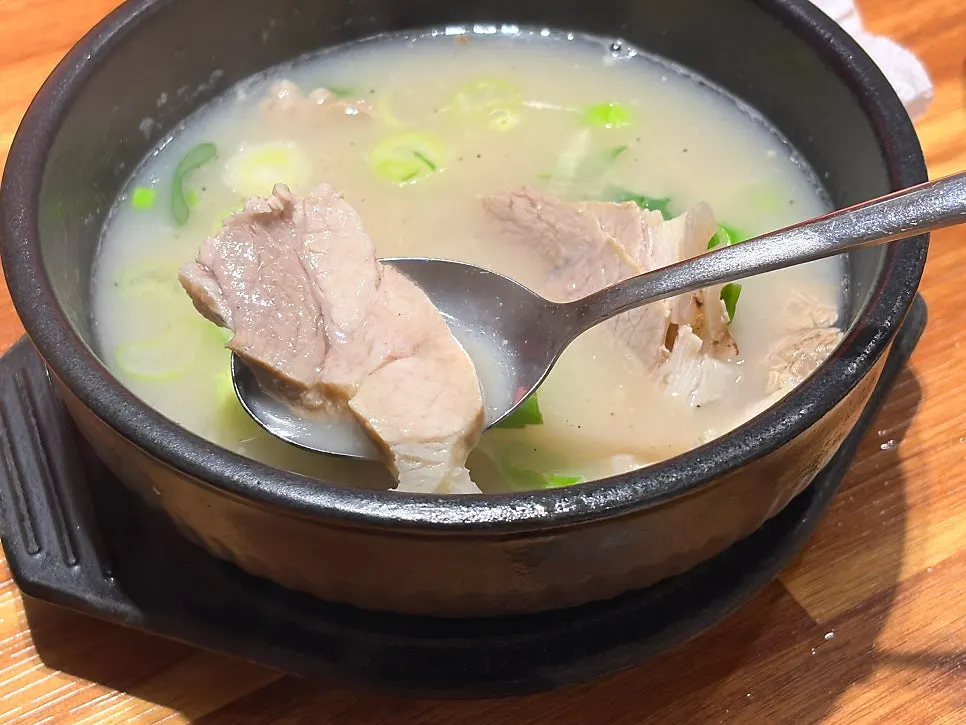 Close-up of tender meat in the dwaeji gukbap