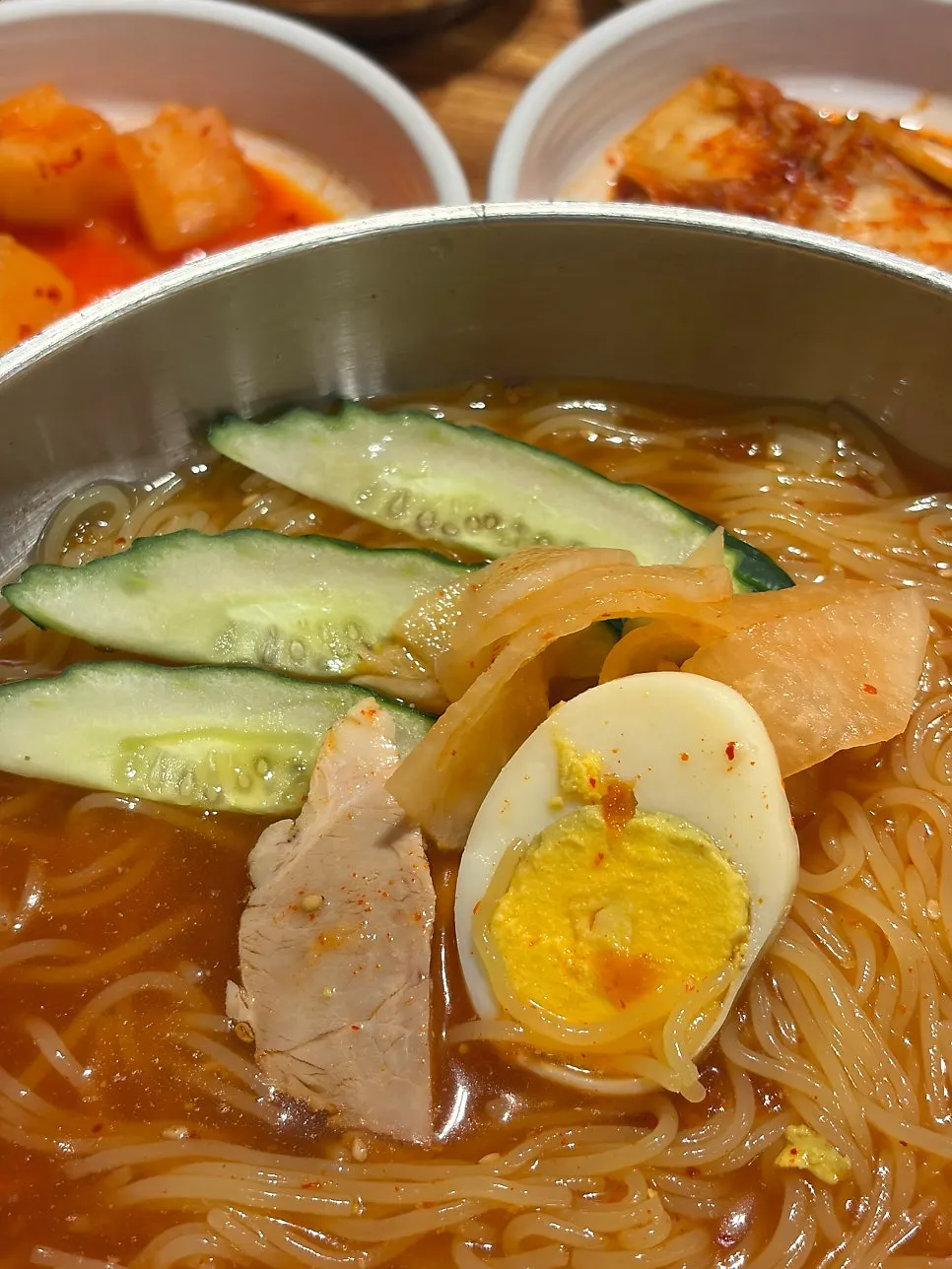 Milmyeon noodles lifted with chopsticks