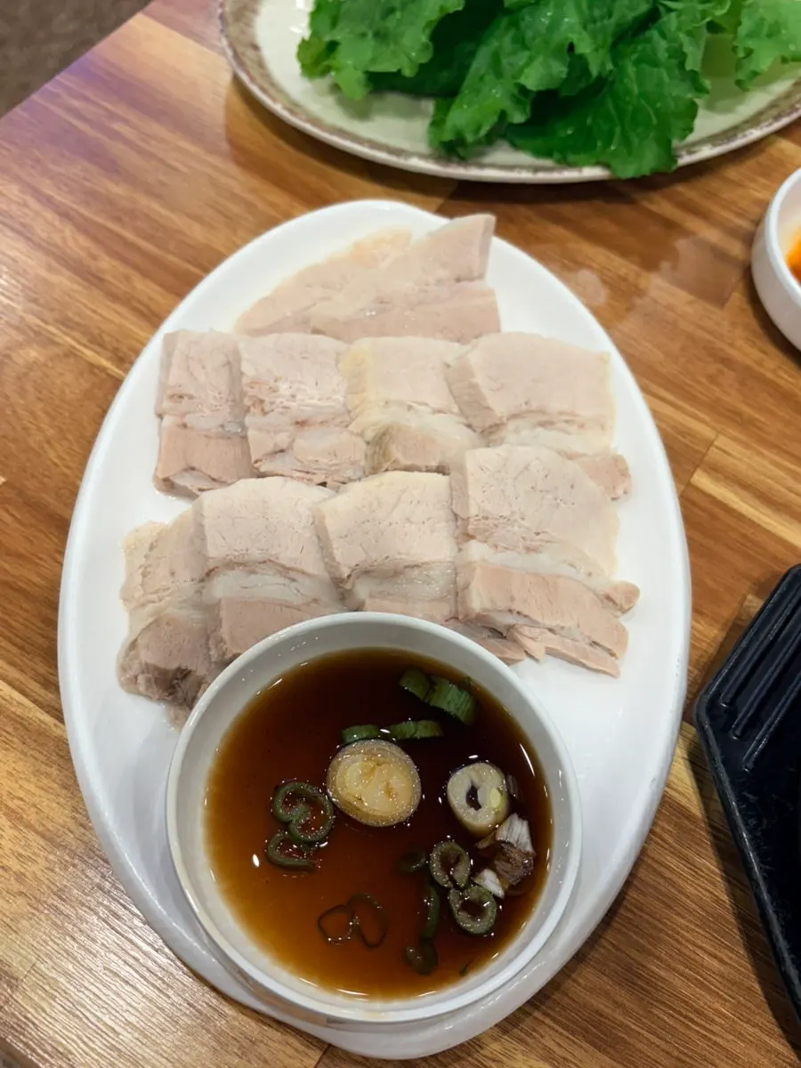 Pork soup with dadaegi chili sauce added