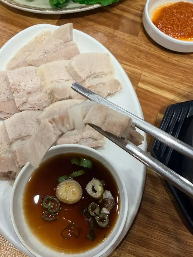 Plate of thickly sliced boiled pork
