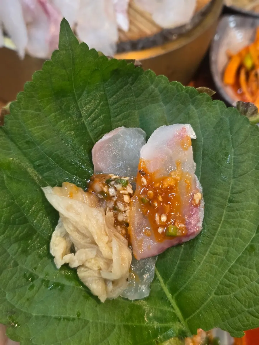 Sashimi with white kimchi and vegetables