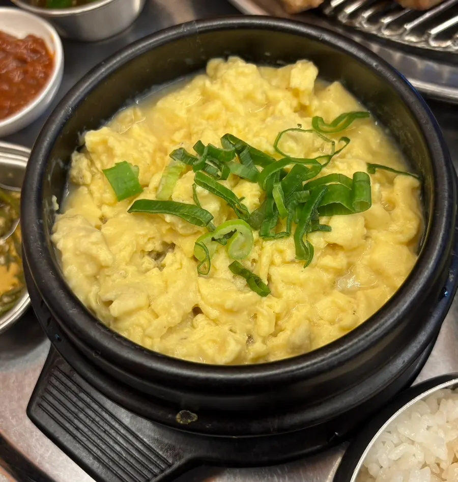 Doenjang jjigae, rice, and ribs on the table