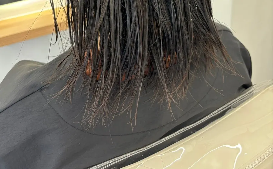 Split ends and damage visible on the hair