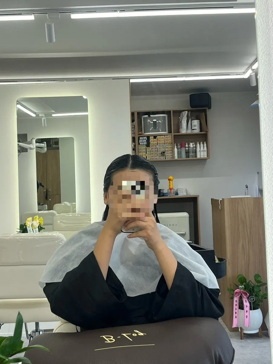Heat treatment during the perm