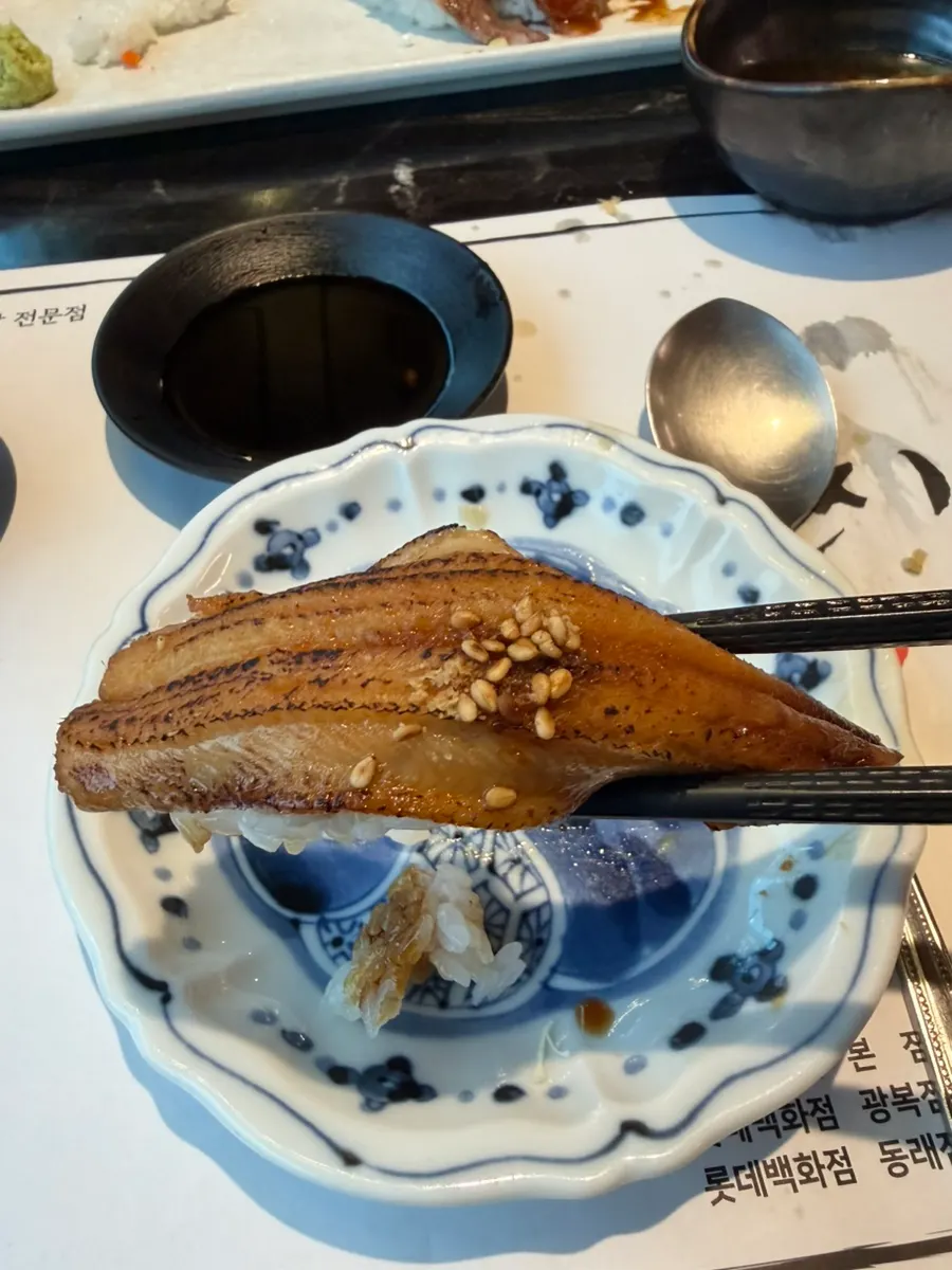 Sushi topped with thick eel and sauce