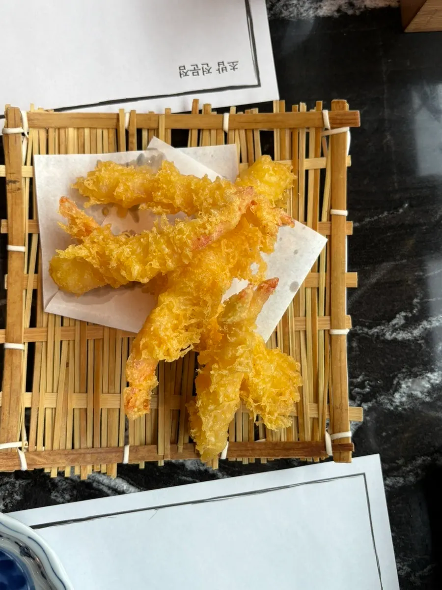 Picking up a piece of sushi