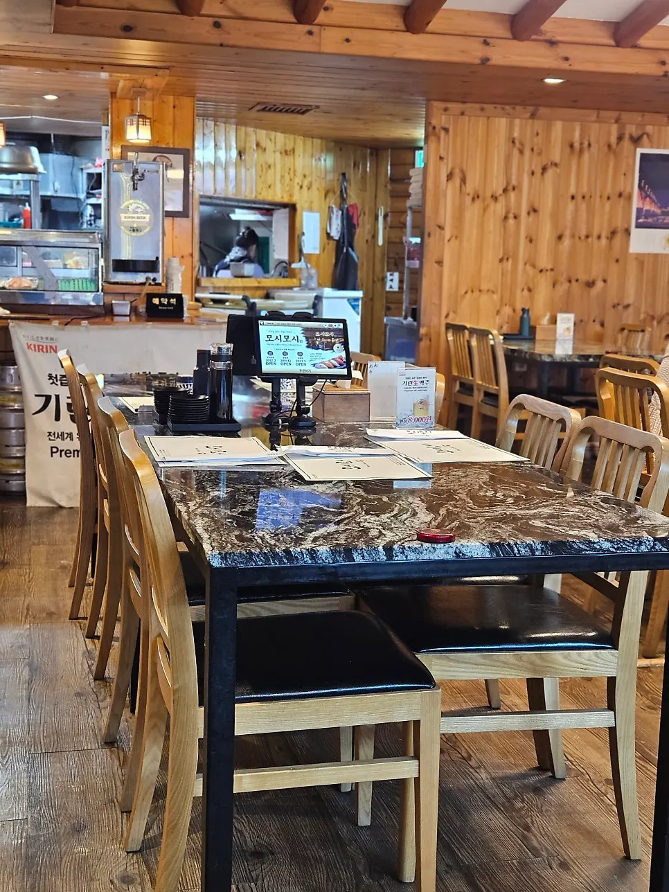 Busy restaurant interior filled with diners