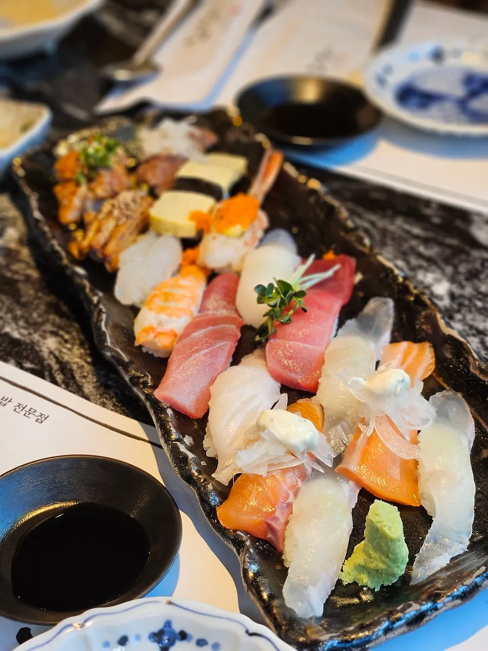 Sixteen pieces of sushi from the set