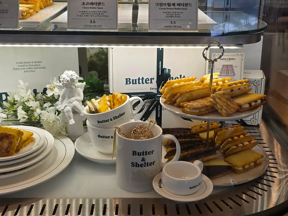 Assorted desserts including cakes and butter rice cakes