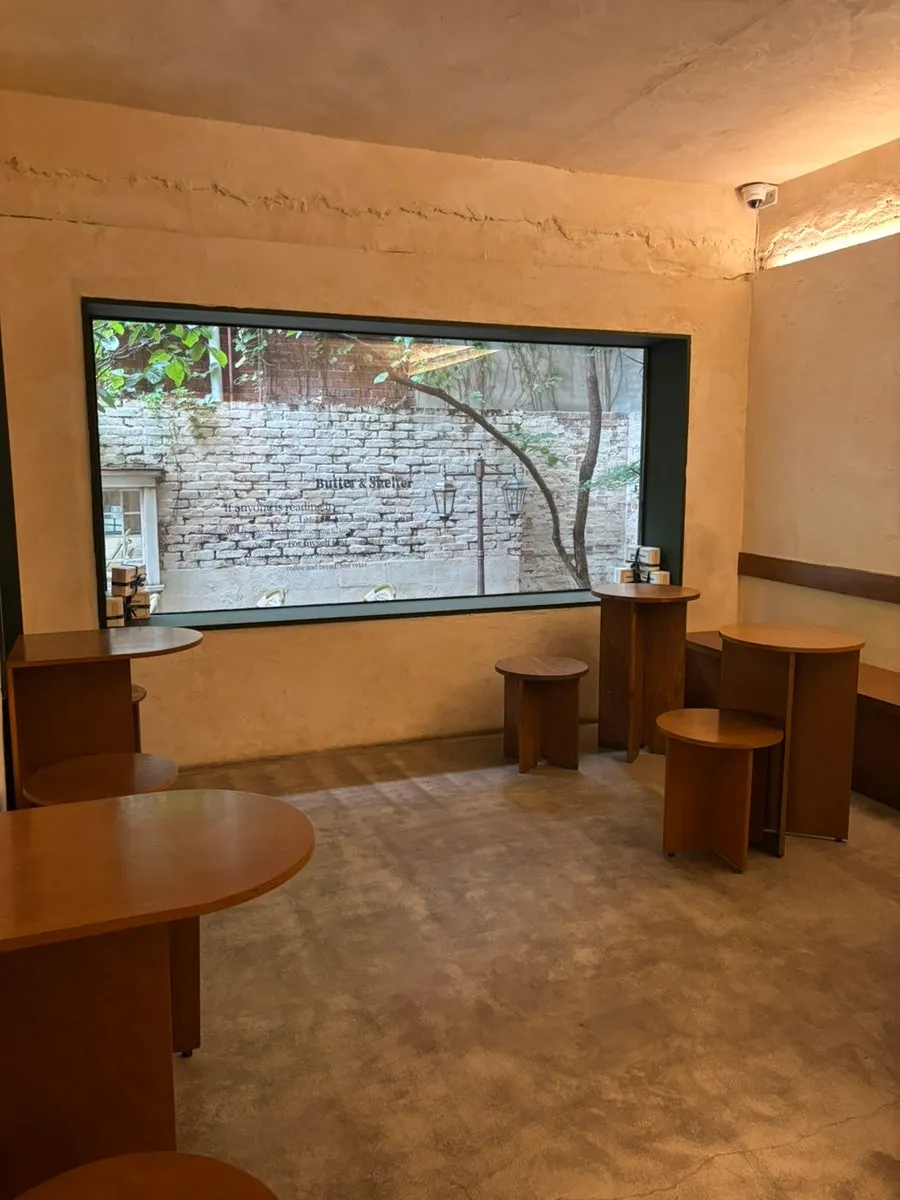 Café interior with wooden tables