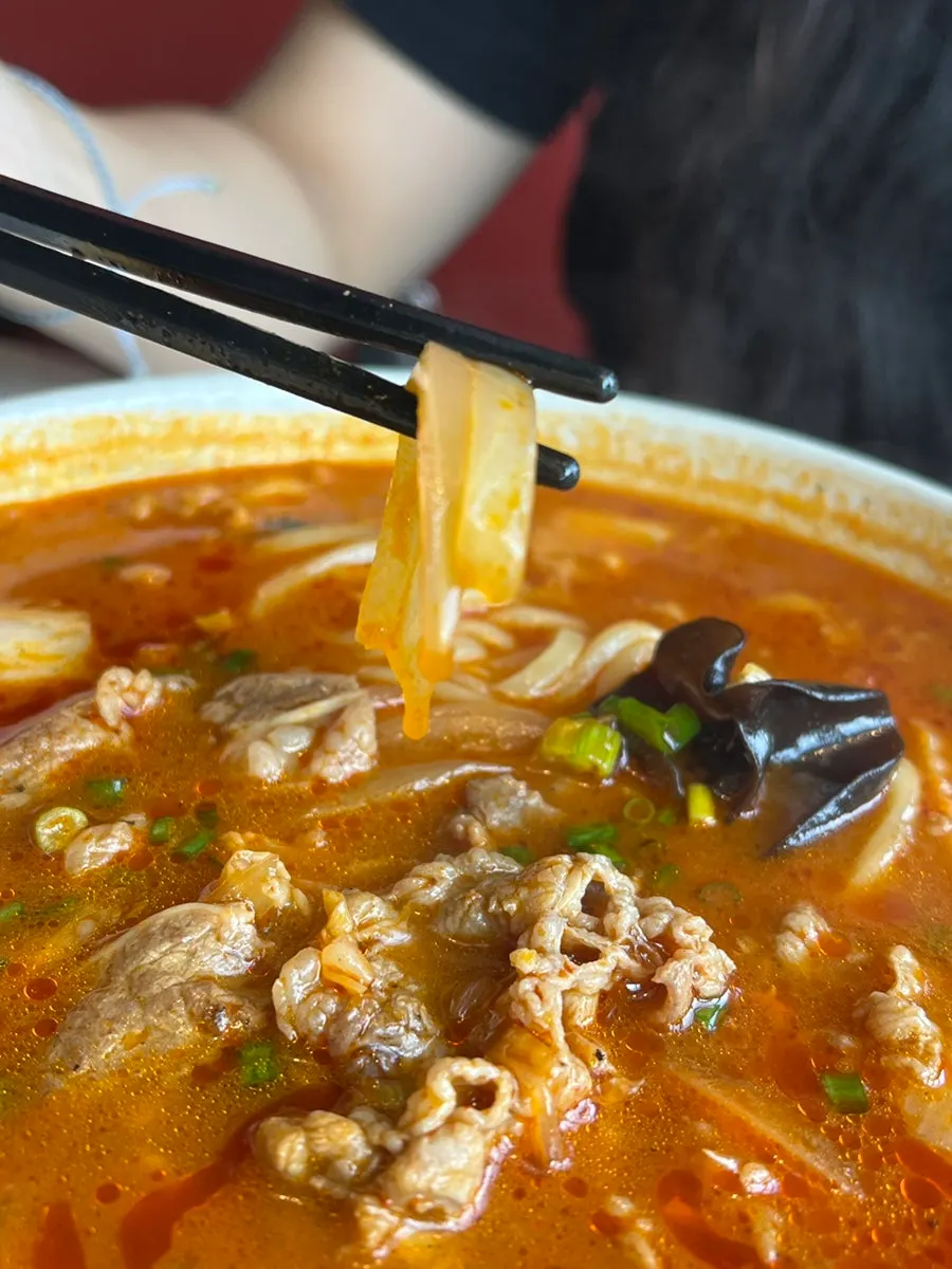 Wood ear mushrooms and onions inside the jjamppong