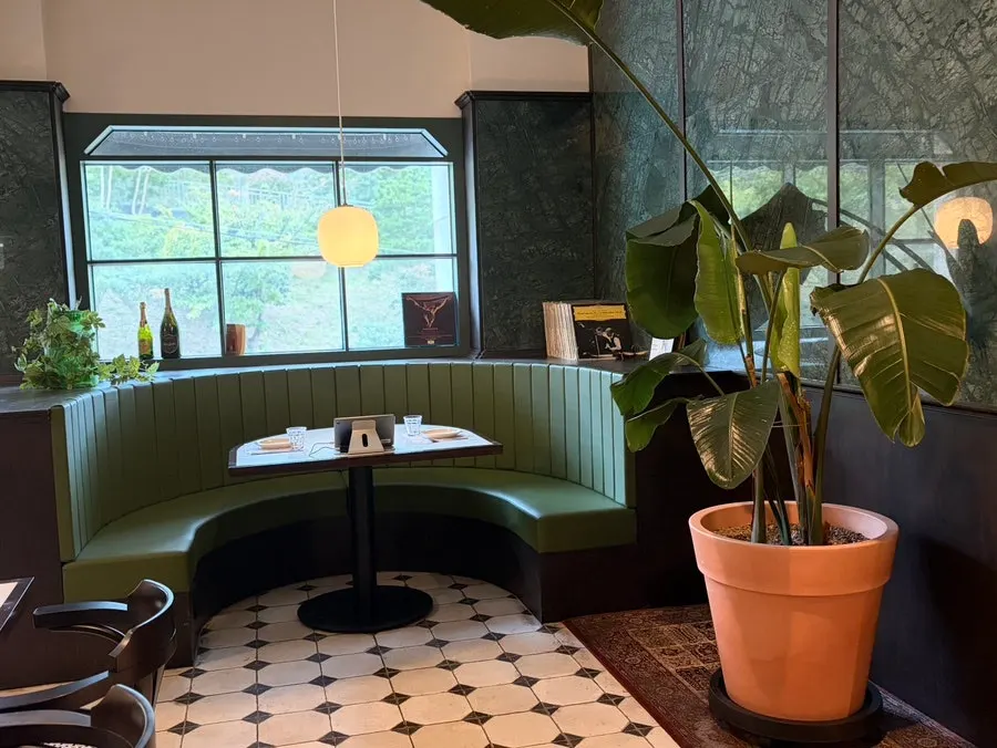 Green-toned interior of the restaurant