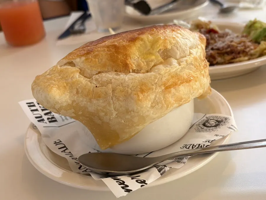 Pumpkin soup topped with pastry