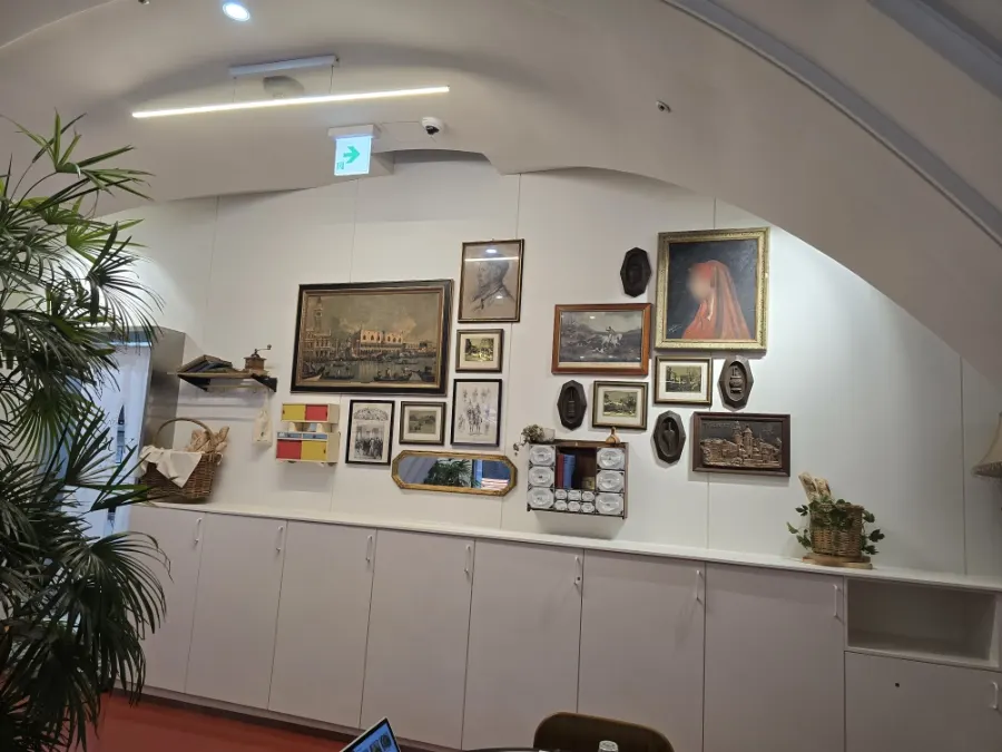 Classic space with framed pictures and decorations on the wall