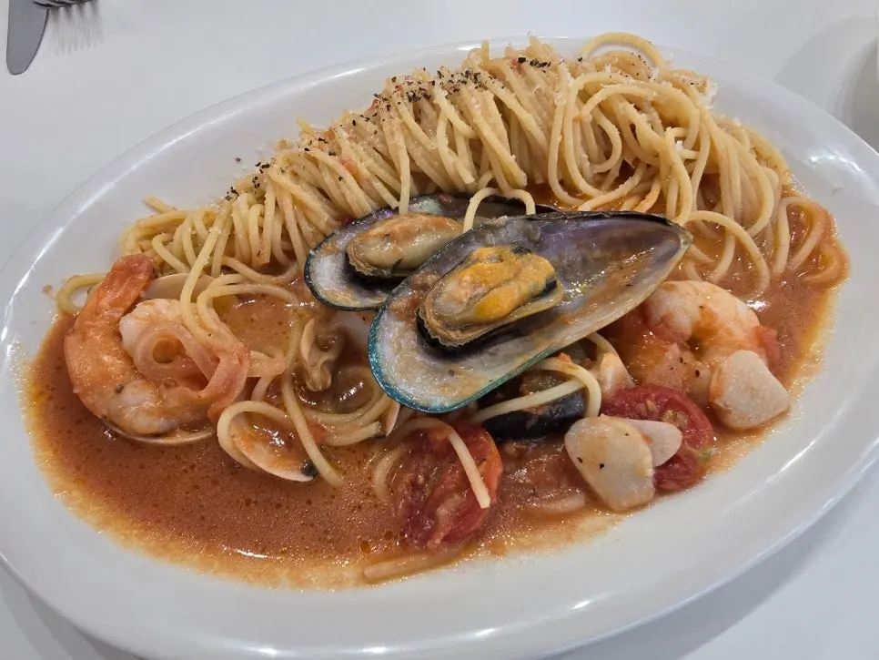 Close-up of tomato sauce pasta noodles