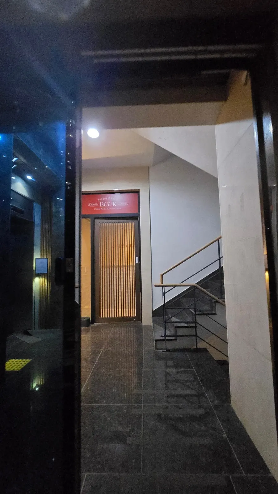 Inner passage of the building leading to the restaurant