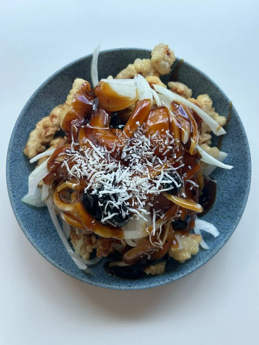 Black vinegar pork with black vinegar sauce