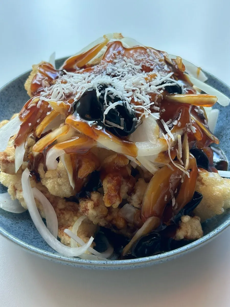 Sweet and sour pork sauce with wood ear mushrooms and onion