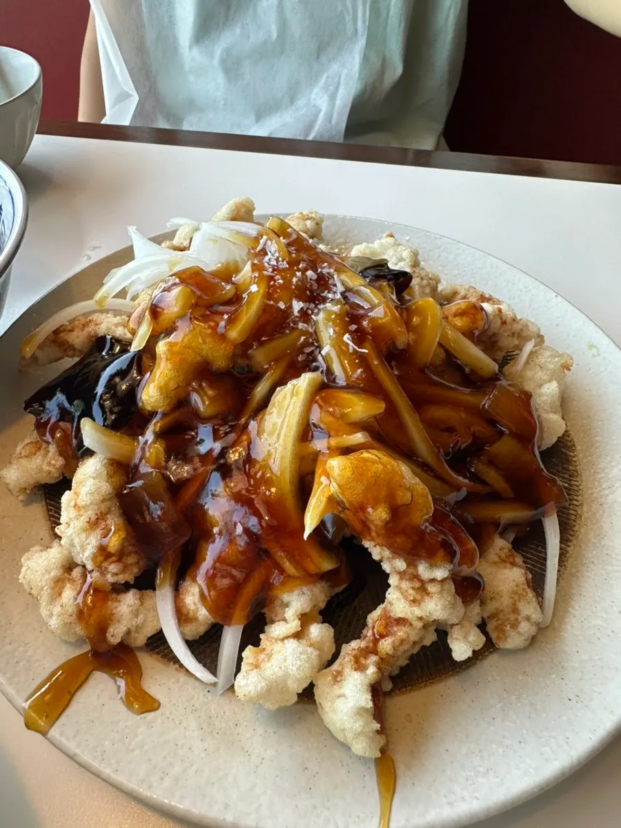 Small black vinegar pork loin tangsuyuk soaked in sauce