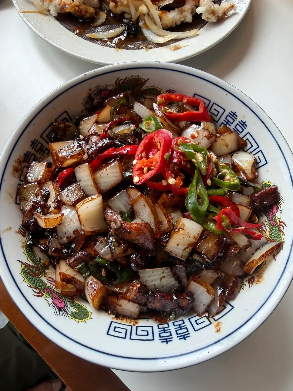 A bowl of beef brisket jjamppong with rich broth