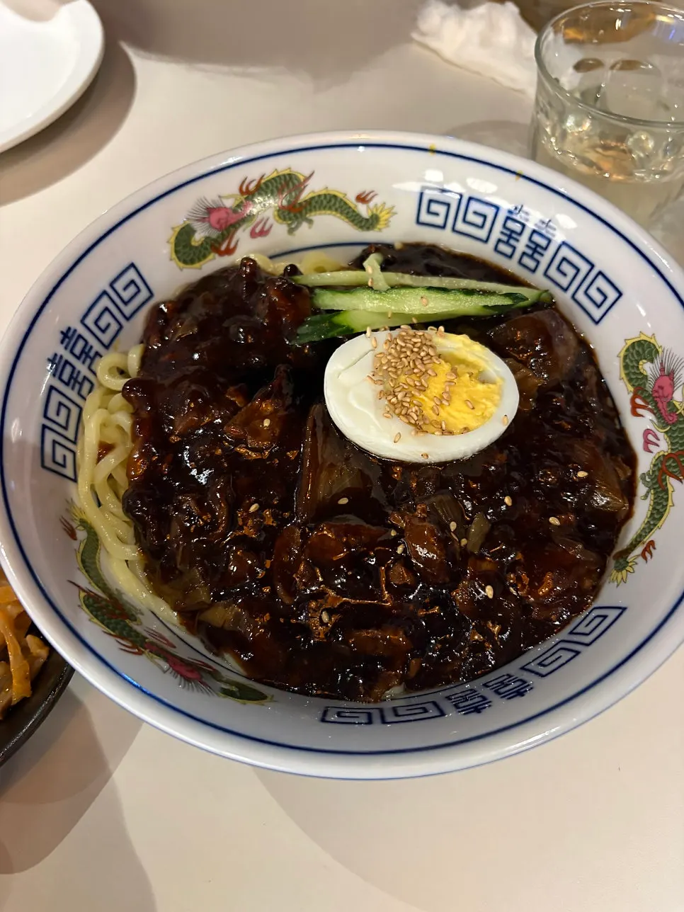 A bowl of jjajangmyeon ordered with the kids
