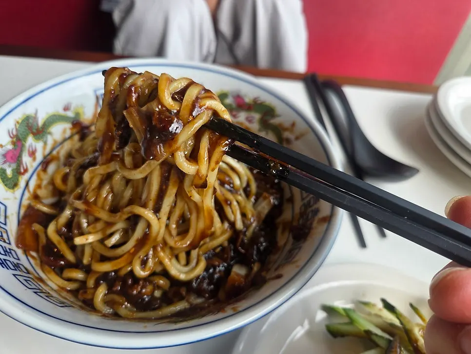 A bowl of BUUK jjajangmyeon mixed and ready