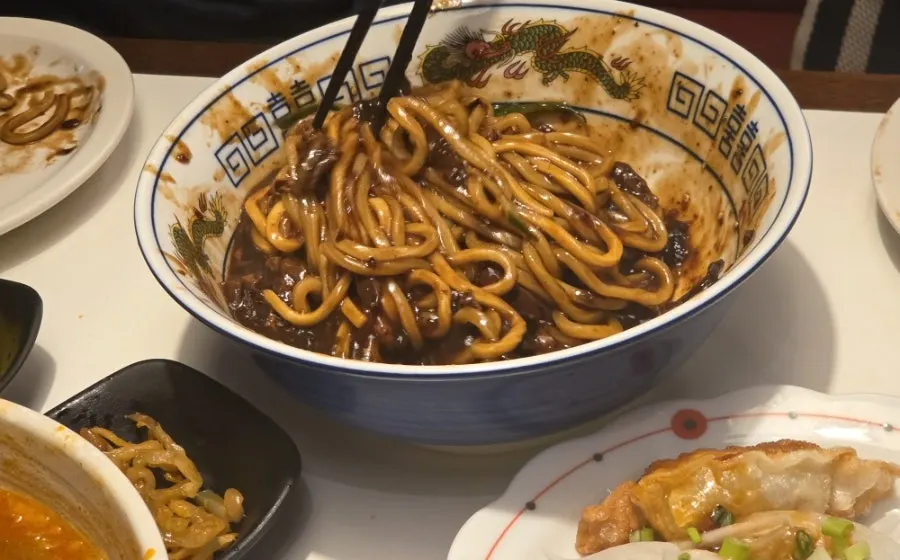 Close-up of tangsuyuk served with sauce